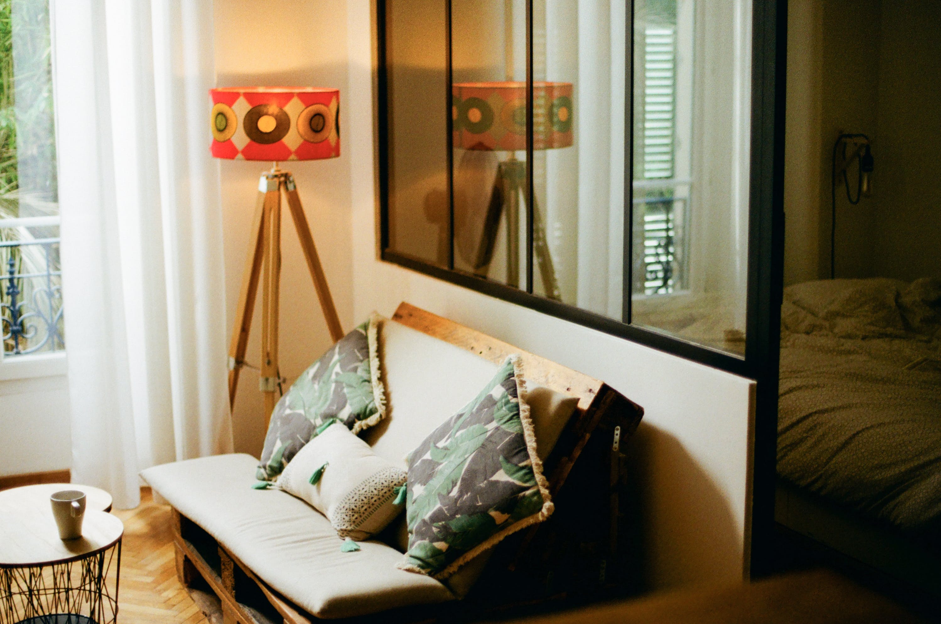 Throw pillows on a couch in an organized living room
